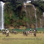 A group of dirt bike riders at Ban Gioc waterfalls of Cao Bang province